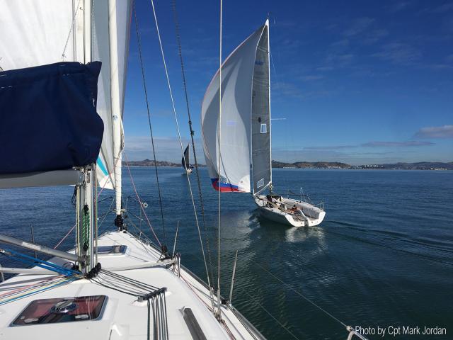 Heading towards Red Rock with a spinnaker up on a zephyr breeze. Photo by Cpt Mark Jordan