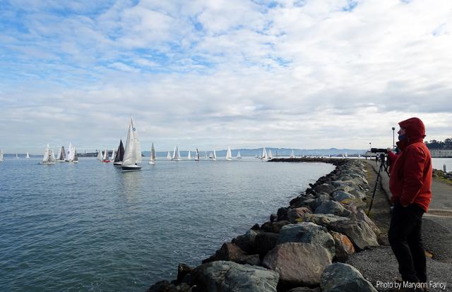 Spectators gather on the shore at the start of the 2021 Three Bridge Fiasco. Photo by Maryann Faricy